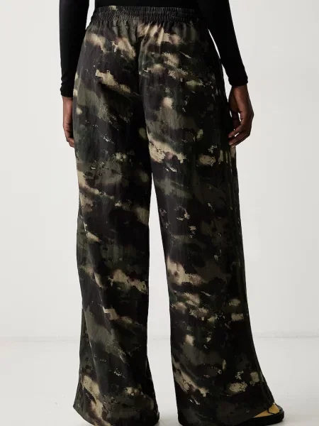 Adidas Originals spodnie dresowe Camouflage Adilenium zielone