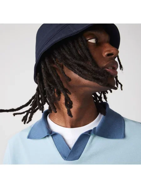 Поло Lacoste голубое