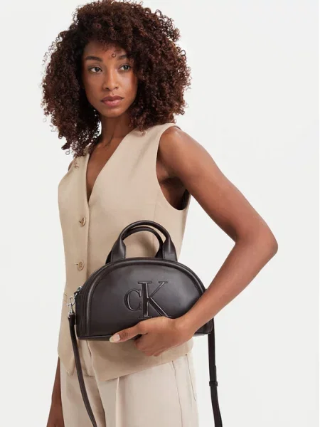 Calvin Klein crossbody torbica iz umetnega usnja rjava
