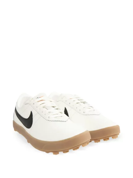 Sneakerși Nike Vomero cu model leopard din piele de căprioară roșu