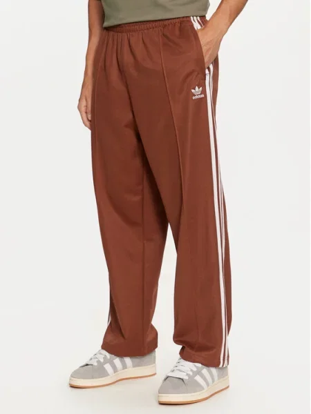 Спортивні штани adidas Originals Baggy Track Pant з аплікацією коричневий