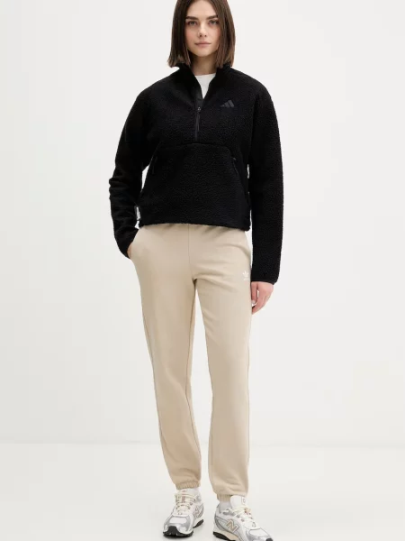 Tepláky adidas Originals béžové