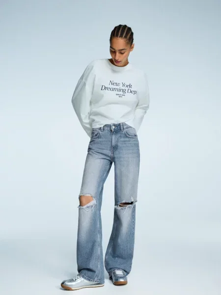 Bershka Jeansy Wide Leg Z Dziurami Kobieta 38 Wyblakły niebieski