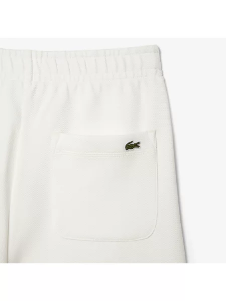 Lacoste Spodnie Dresowe Z Piki Kremowe białe