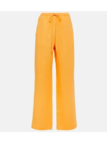 Pantaloni Nanushka de in portocaliu