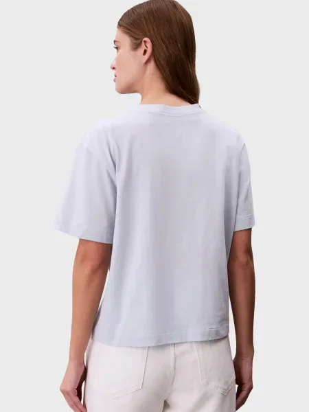 Графічний футболка Calvin Klein Jeans блакитна