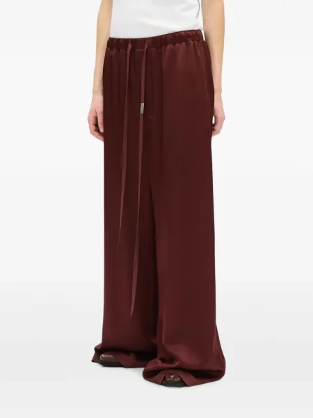 Pantaloni Ann Demeulemeester din satin cu cordon roșu