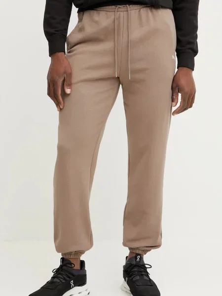 Спортен панталон Puma с изчистен дизайн кафяво