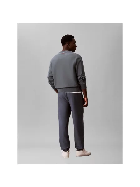 Froté nohavice Calvin Klein Jeans sivá
