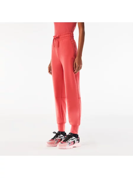 Зауженные спортивные штаны Lacoste розовые