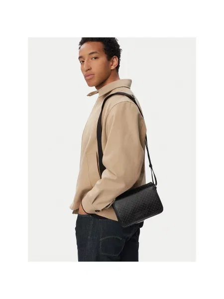 Crossover torbica Calvin Klein Emblem Aop Coated Small Flap Mes crna
