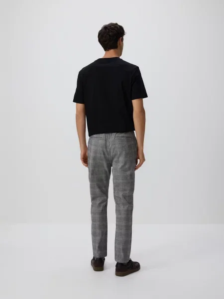 Клетчатые брюки Reserved серые