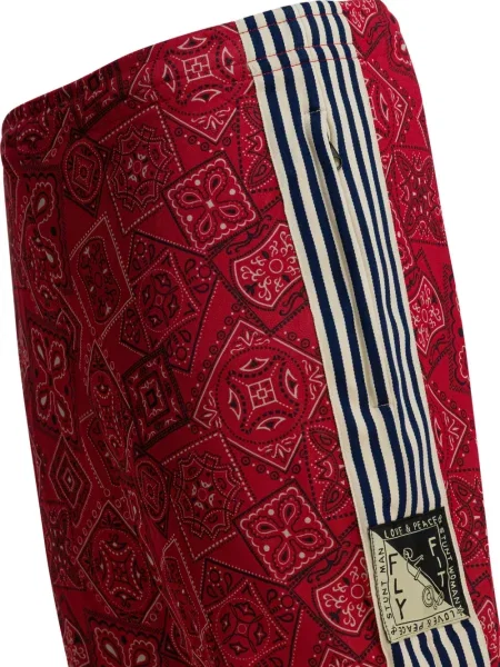 Pantaloni Kapital cu dungi roșu