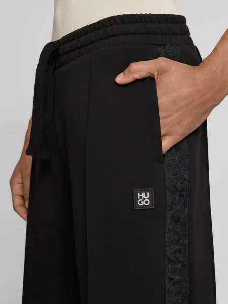 Spodnie dresowe o kroju comfort fit z mieszanki bawełny model DROSPANT' Hugo czarny