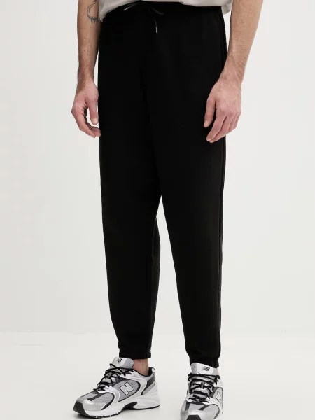 Tommy Jeans trenirka z bombažem črna