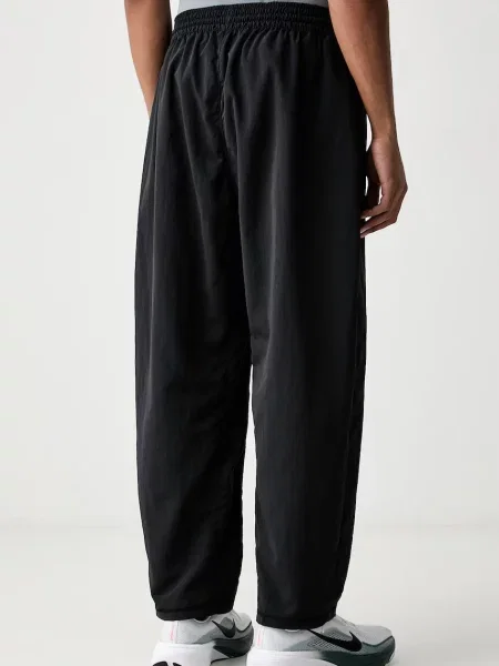 Nike spodnie treningowe N.A.C. czarne
