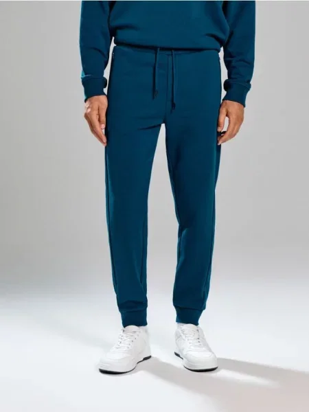 Sinsay Kalhoty regular fit zelená