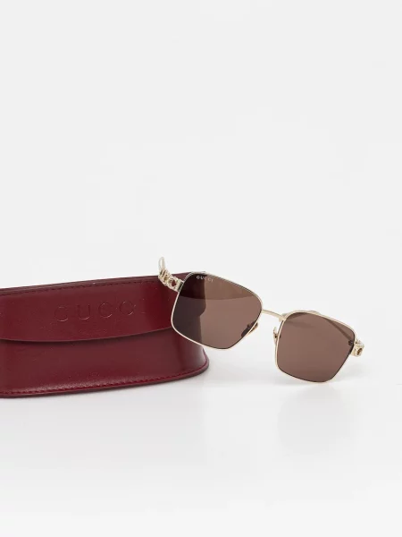 Солнцезащитные очки Gucci золотые