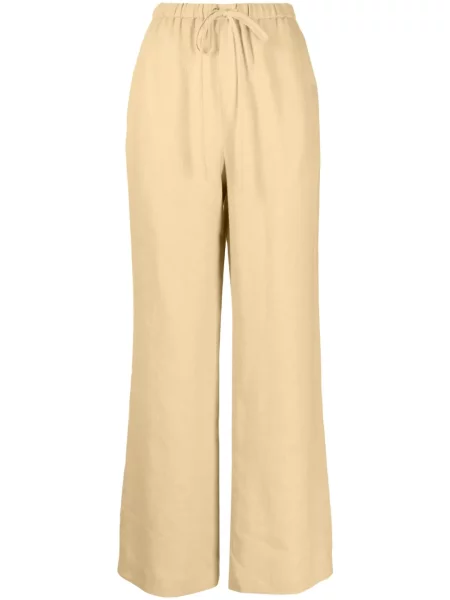 Pantaloni Nanushka de in galben