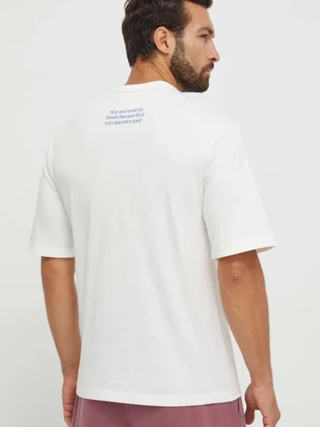 Tričko Reebok s potiskem béžová
