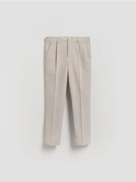 Элегантные брюки Reserved бежевые