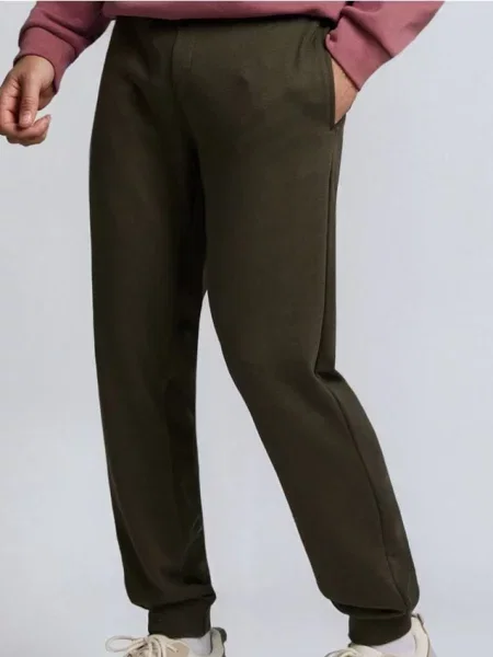 Sinsay Spodnie jogger slim fit zielony