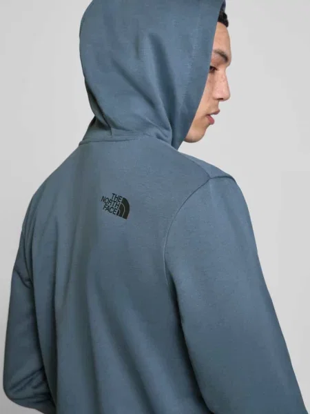 Bluza z kapturem o kroju regular fit z nadrukiem z logo The North Face niebieska