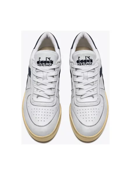 Sneakersy Diadora skórzane z przetarciami białe