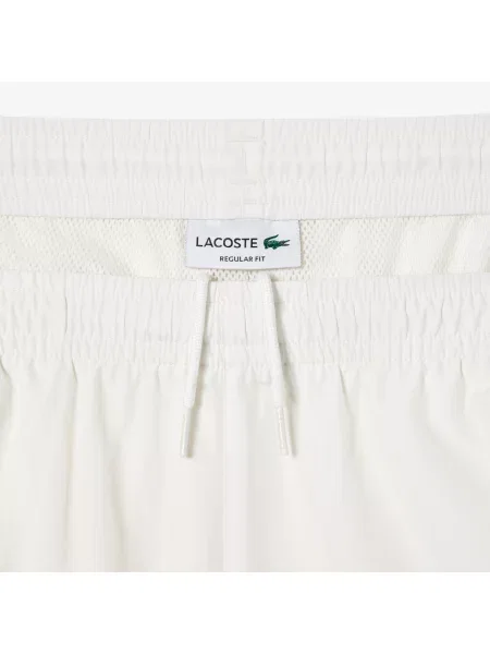 Lacoste Spodnie Dresowe Nieprzemakalne beżowy