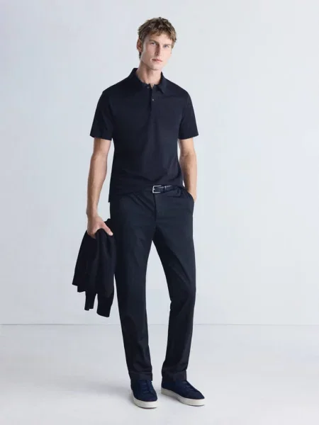 Spodnie slim fit z termoregulującej mieszanki wełny Mężczyzna 38 MANGO MAN granatowy