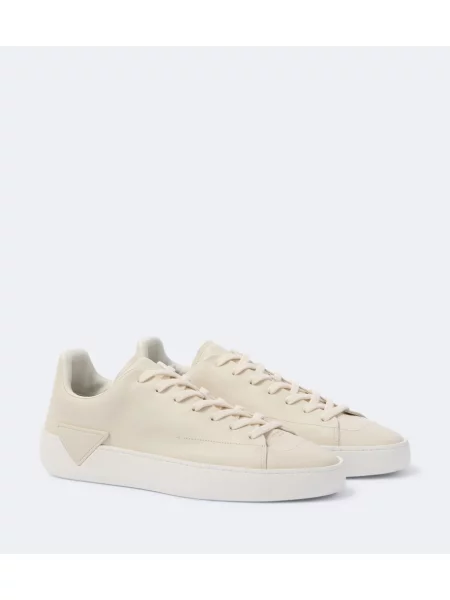 Sneakerși Prada din piele bej