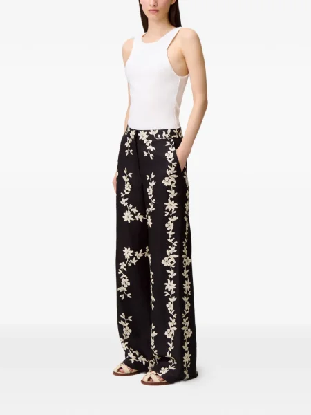 Spodnie Claudie Pierlot w kwiatki z nadrukiem czarne