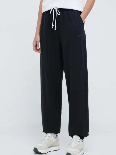 New Balance Spodnie Dresowe Athletics beige czarne