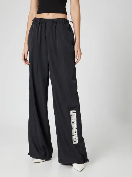 ABOUT YOU x Millane Pantaloni Lia gri deschis / negru alb