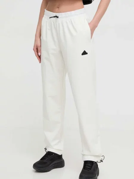 Спортивні штани adidas бежевий
