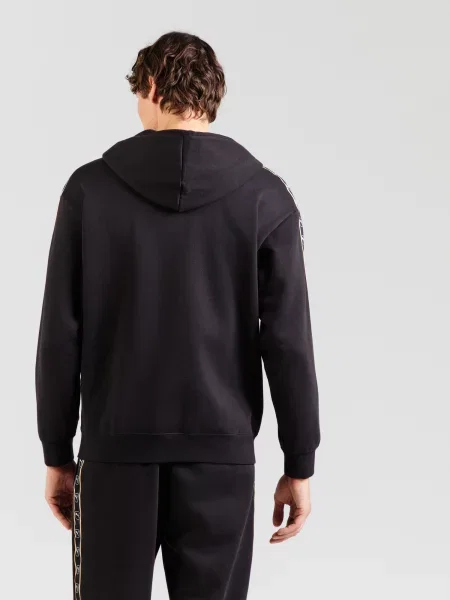 PUMA Tepláková bunda Ess zlatá žltá / čierna biela