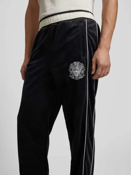 Spodnie typu track pants o rozkloszowanym kroju z kieszenią z tyłu Billionaire Boys Club czarne