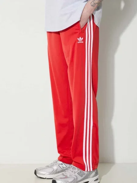 Adidas Teplákové kalhoty adicolor Classics Firebird červená