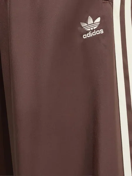 Spodnie Adidas z siateczką na platformie w paski szare