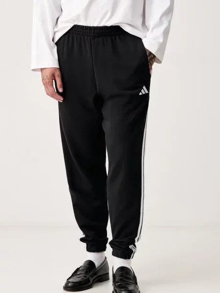 Adidas pantaloni de trening pentru bărbați din Essentials negru