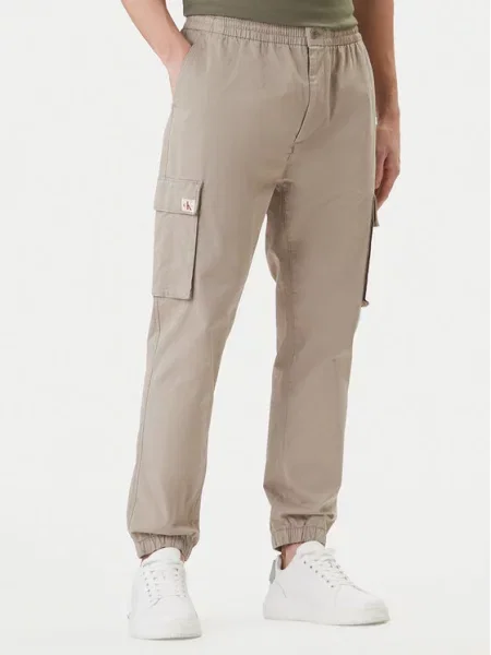 Joggers kalhoty Calvin Klein Jeans béžové