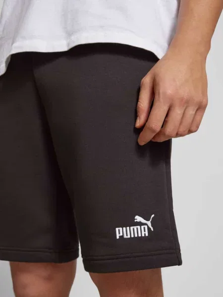 Szorty z dzianiny dresowej o kroju regular fit z wyhaftowanym logo model ‘ESS No. 1’ Puma Performance czarne