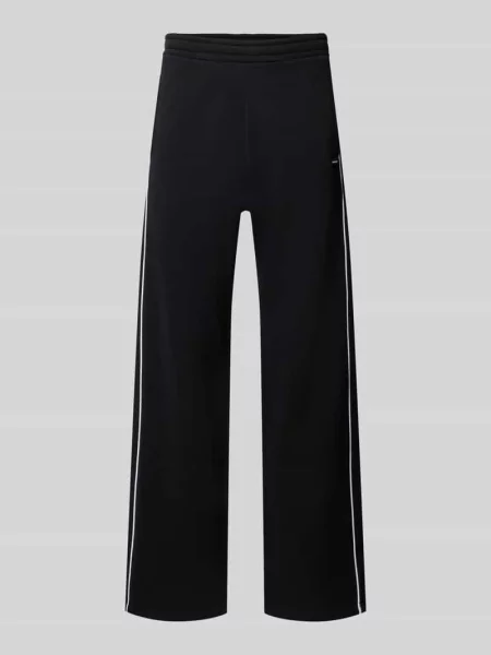 Spodnie dresowe o kroju straight fit z czystej bawełny z naszywką z logo Review czarne