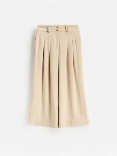 Reserved Pantaloni cu adaos de bej