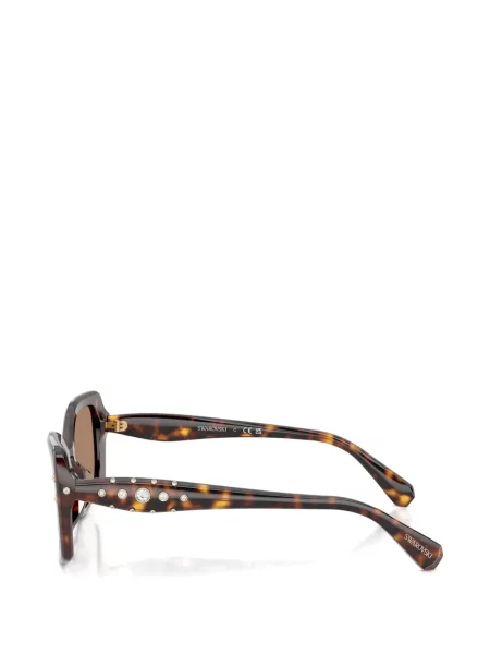 Saulės akiniai Swarovski Eyewear su kristalais ruda