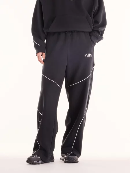 Спортивні штани New Balance Trackside Fleece бавовна/перероблений чорний