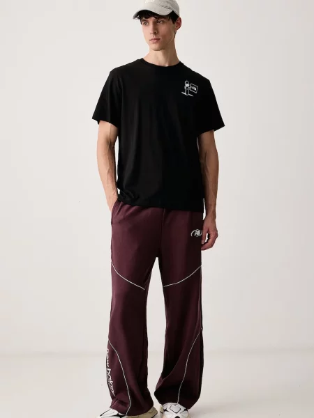 New Balance pantaloni de trening pentru bărbați cu