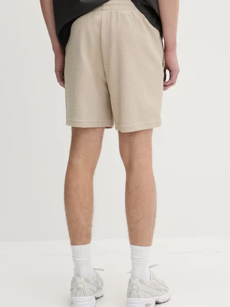 Szorty treningowe o kroju regular fit z elastycznym pasem Adidas Originals beżowe