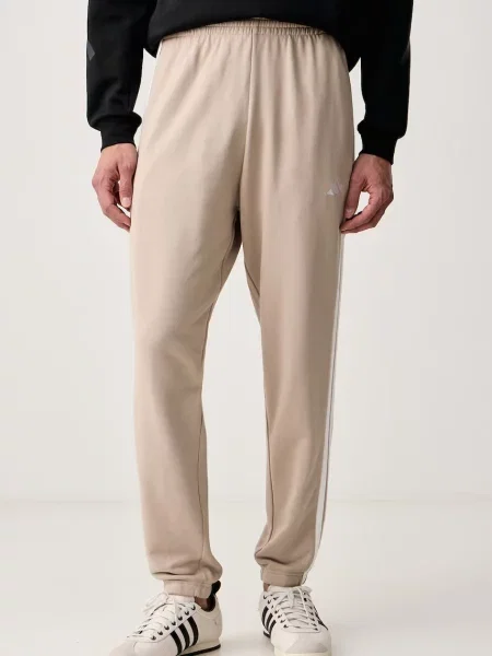 Adidas pantaloni de trening pentru bărbați din Essentials alb