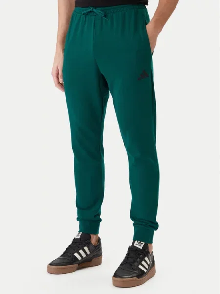 Adidas Teplákové nohavice Essentials Feel Cozy zelená